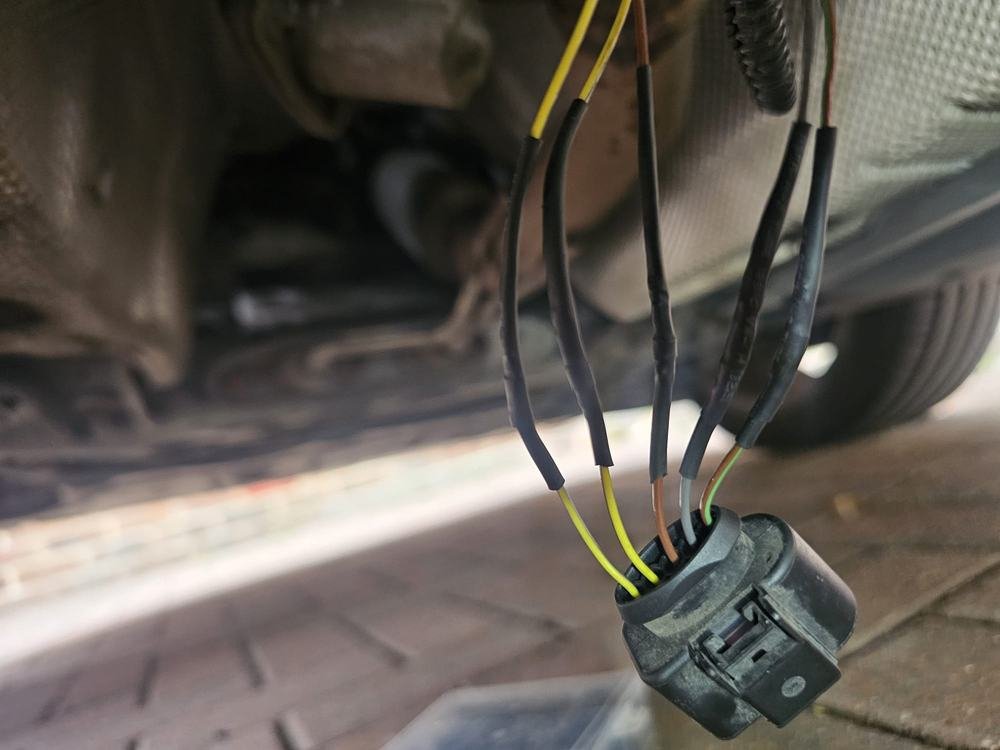A wiring connector with cables under inspection